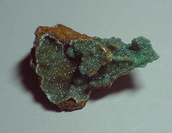 Адамин  (включая  мангано- и купро- адамин) (Adamite)